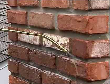 Chimney Leaks   Applying Water Proofing 